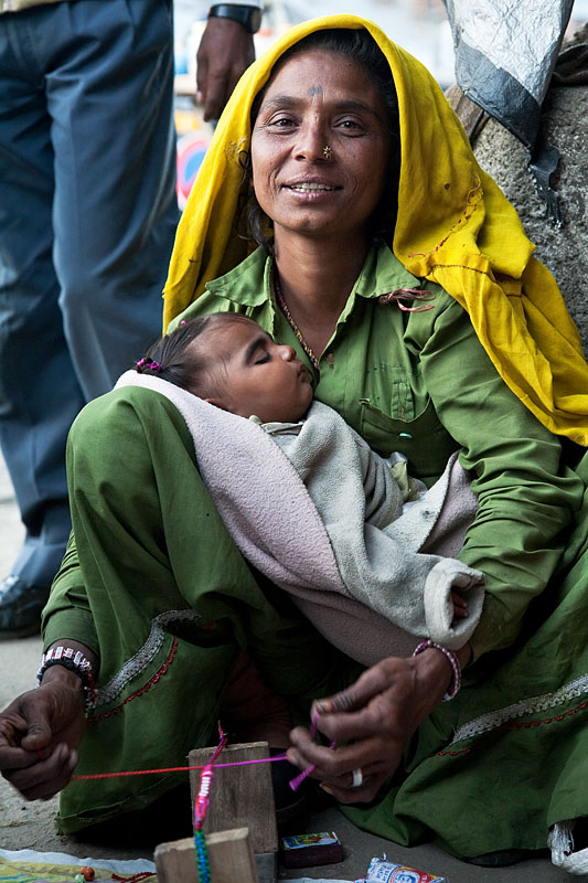  Hindustan woman selling handmade bracelets on the market of Ziro
